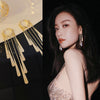 Golden long tassel earrings