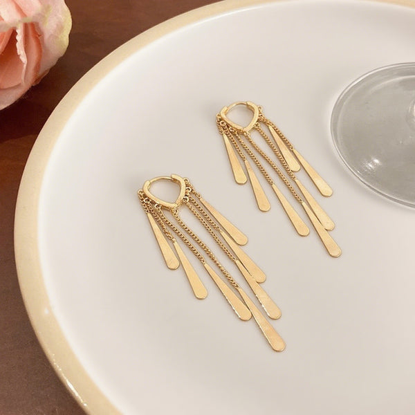 Golden long tassel earrings