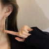 Metal long drop earrings