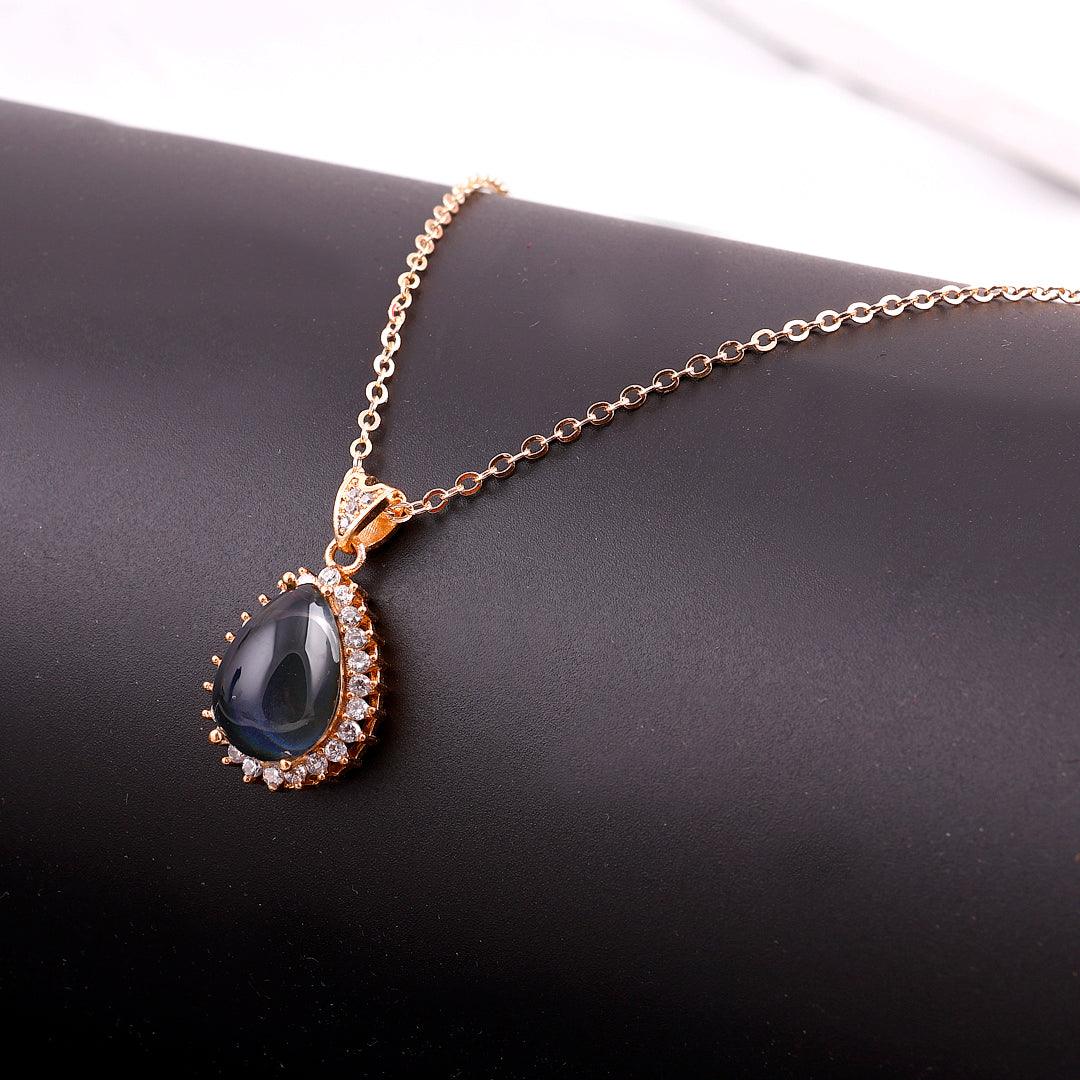 Gold-Toned Necklace with Black Teardrop Pendant