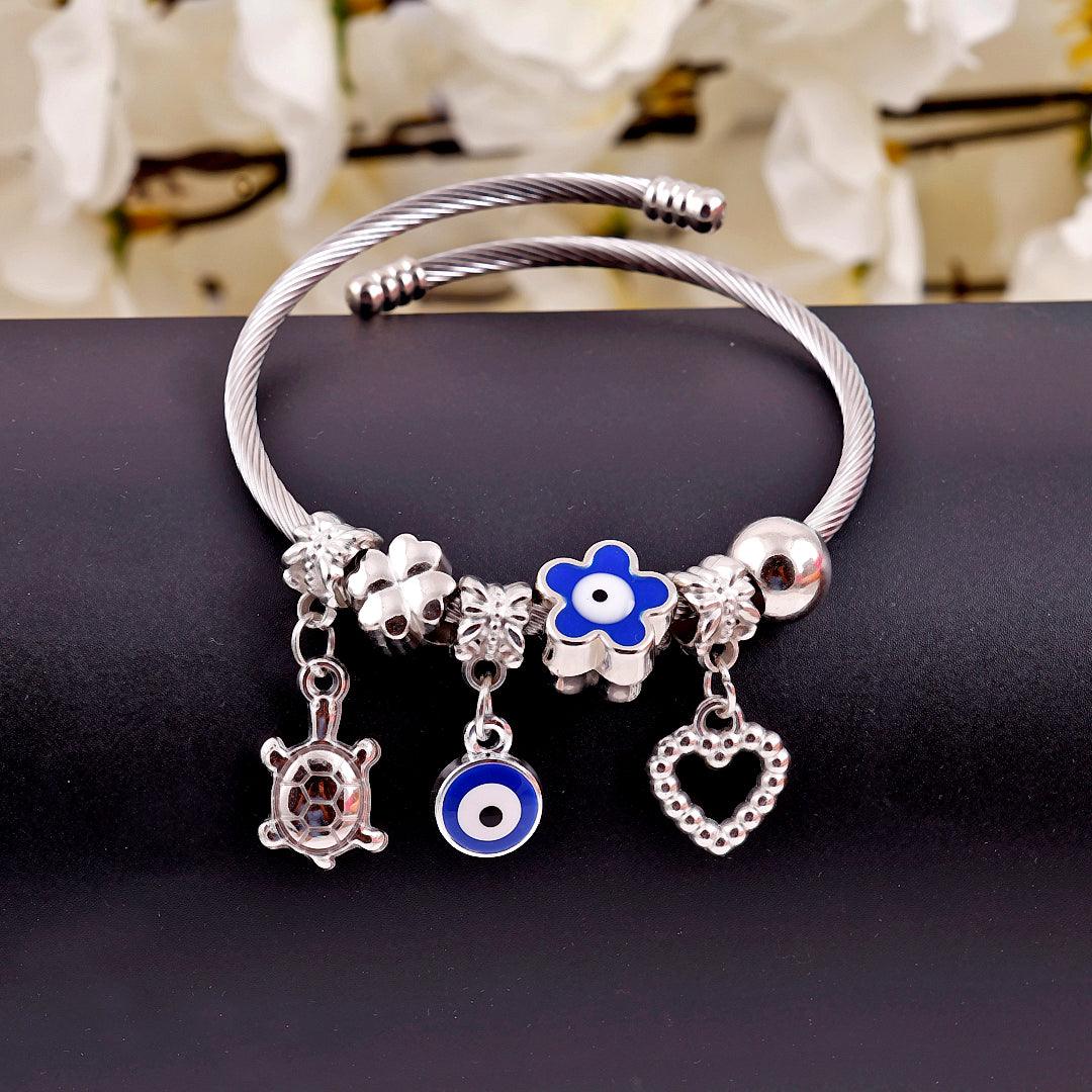 Silver Charm Bracelet with Blue Accents