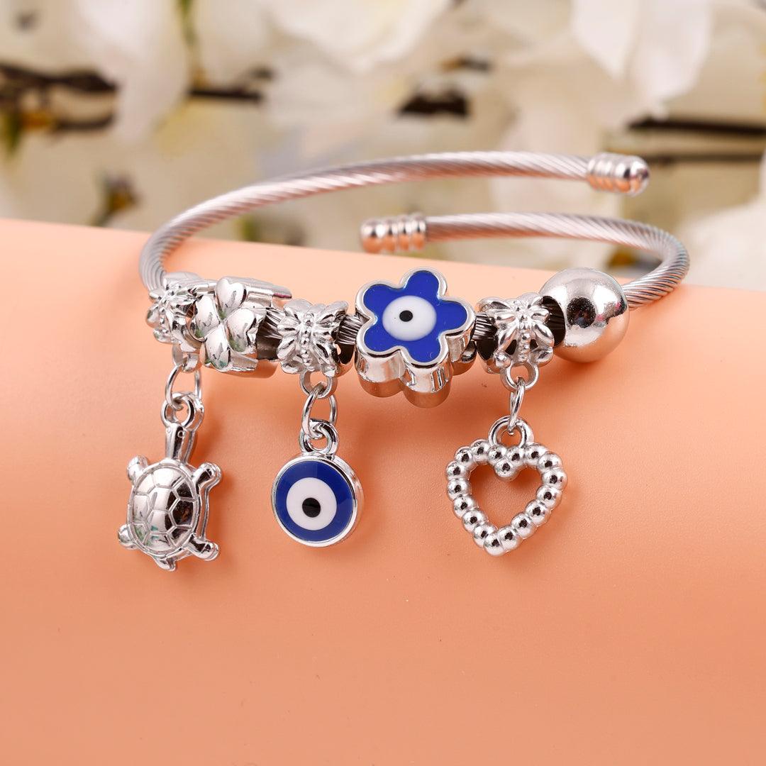 Silver Charm Bracelet with Blue Accents