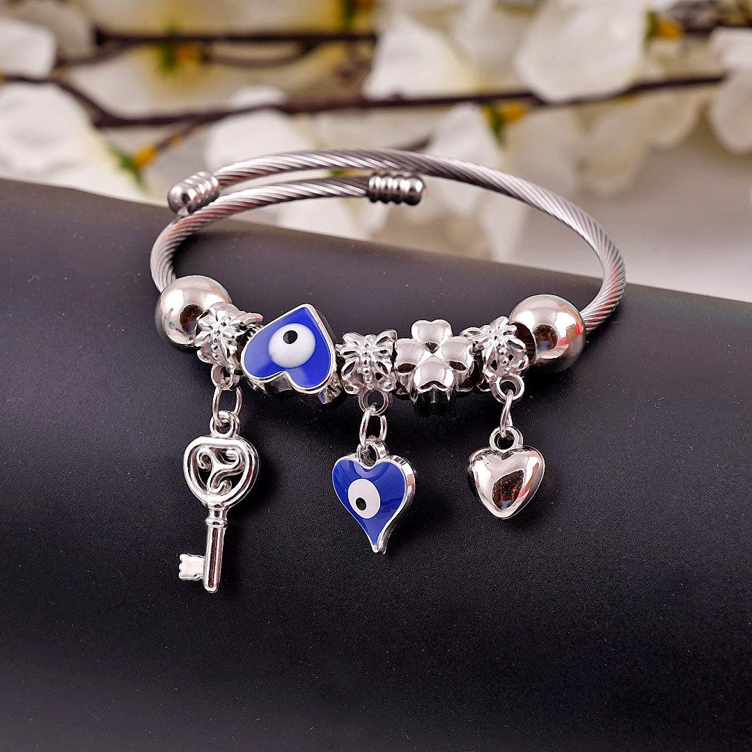 Silver Charm Bracelet with Blue and Silver Accents