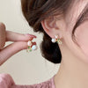 Pack Of 2 Blck Star Pearl Earrings