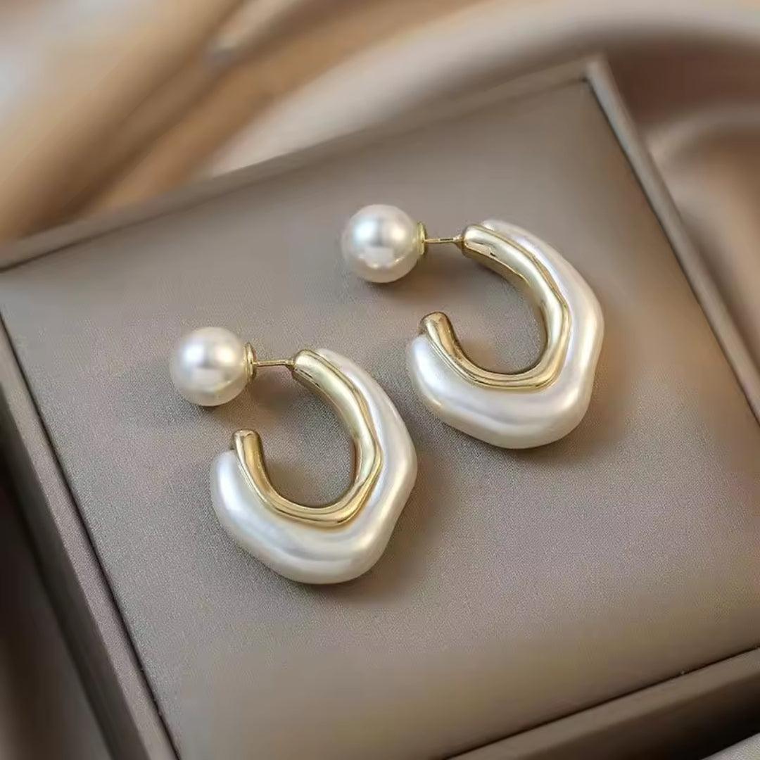 white & golden earrings