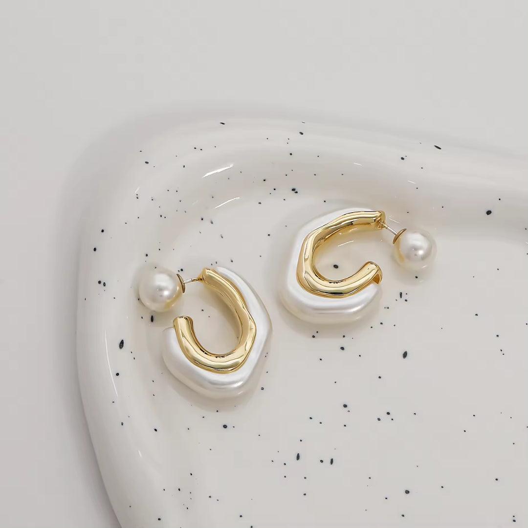 white & golden earrings