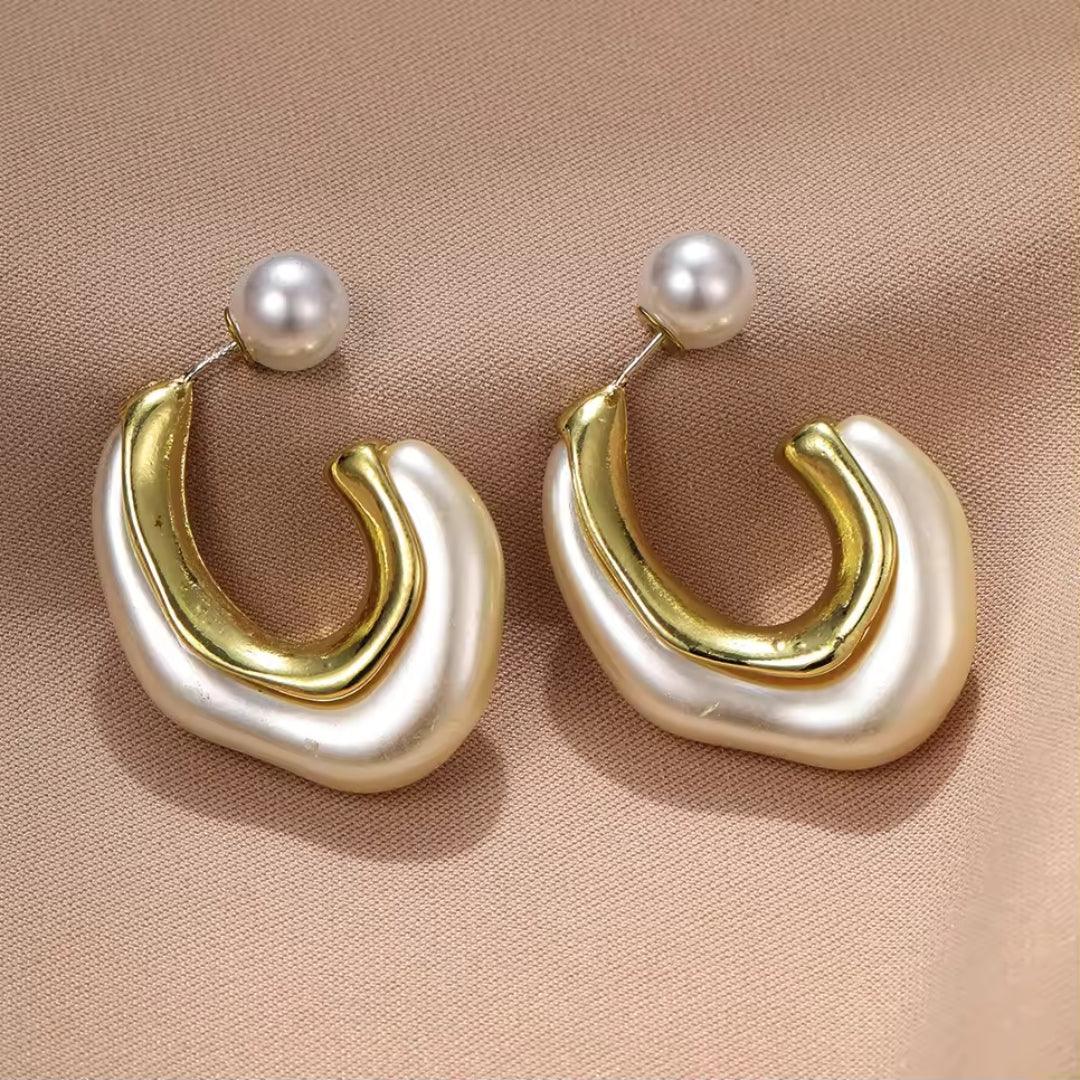 white & golden earrings