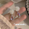 White floral earring