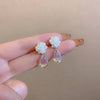 White floral earring