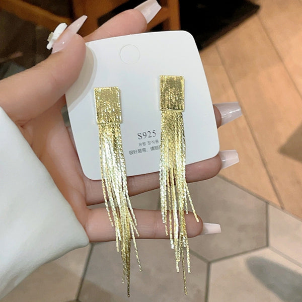 Gold tassel earrings