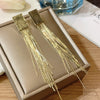 Gold tassel earrings