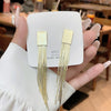 Gold tassel earrings