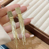 Gold tassel earrings