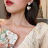 Dual Hearts Pearl Earring