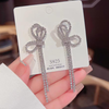 Shiny Bow Dangling Earrings
