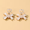 Heart Shaped Pearl Bow Earring