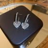 White stone heart drop earrings