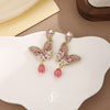 Pink pearl Butterfly earrings