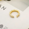 Simple Golden Zircon Stone Rings