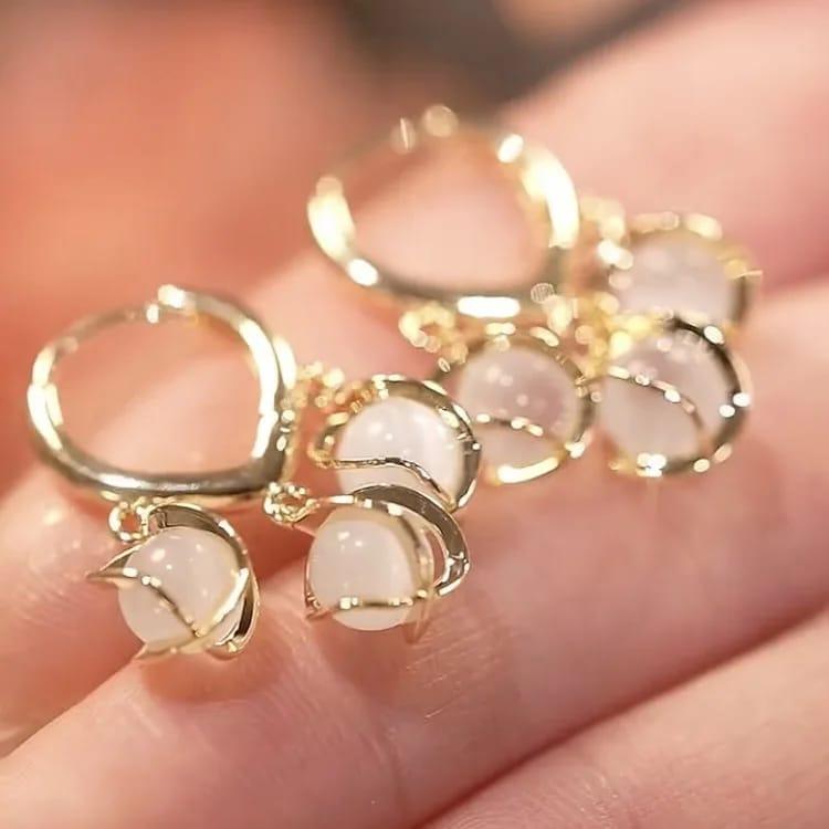 Gold-Toned Hoop Earrings with Dangling White Stone Charms