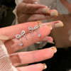Rhinestone bow stud earrings