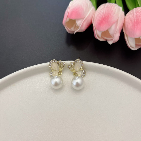 Butterfly pearl earrings