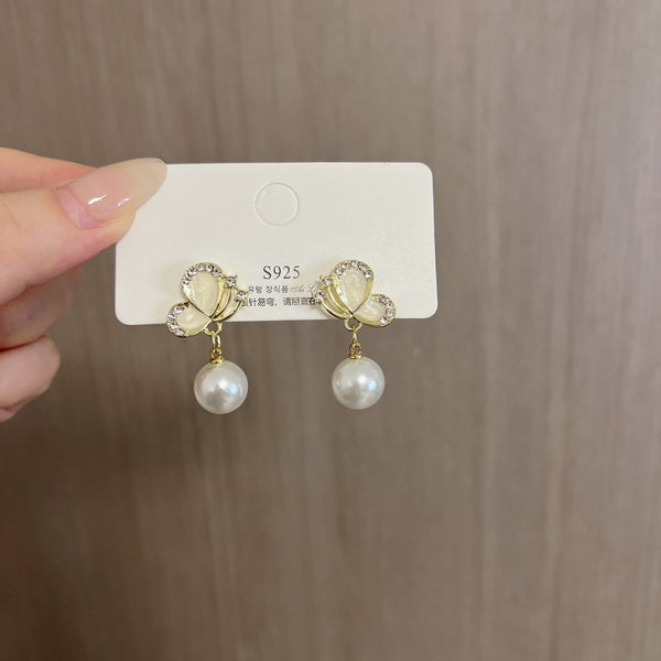 Butterfly pearl earrings