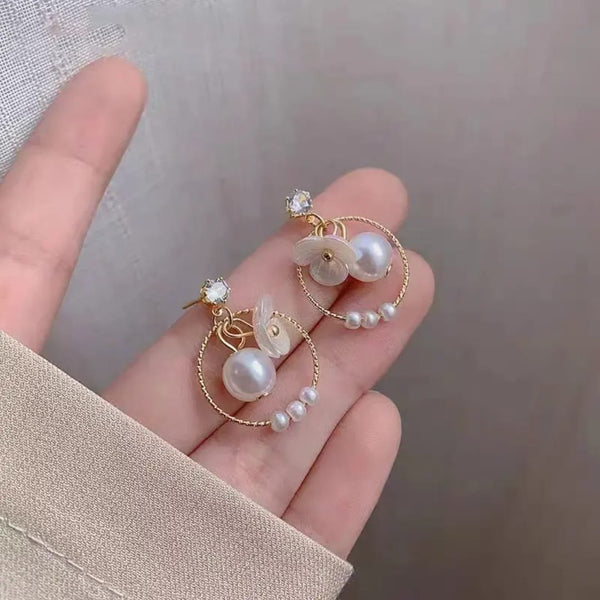 Charming white pearl earring