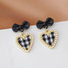 Eye-catching Bowknot Pearl Drop