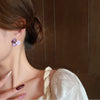 Pack Of 2 Purple Flower Pearl Earrings
