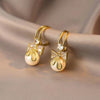 Gold Bow Pearl Drop Earrings