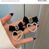 Delightful Black Bow Heart Earring