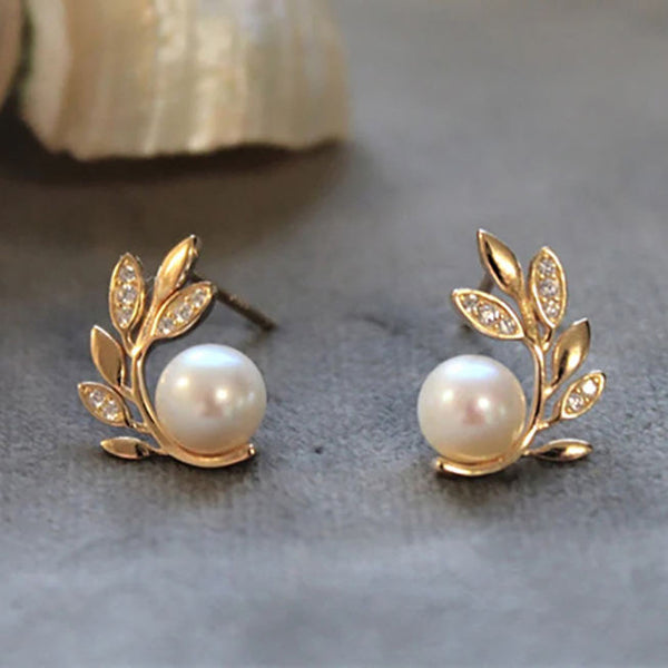 Gold plated and pearl leaf earring