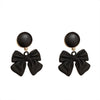 Black bow motif earring