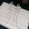 floral elements long drops Earring