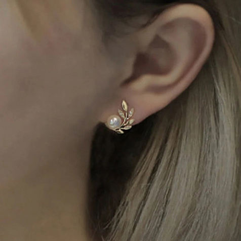 Gold plated and pearl leaf earring