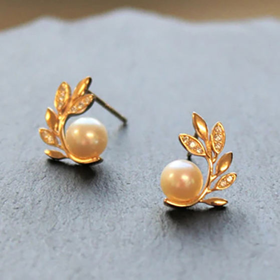 Gold plated and pearl leaf earring