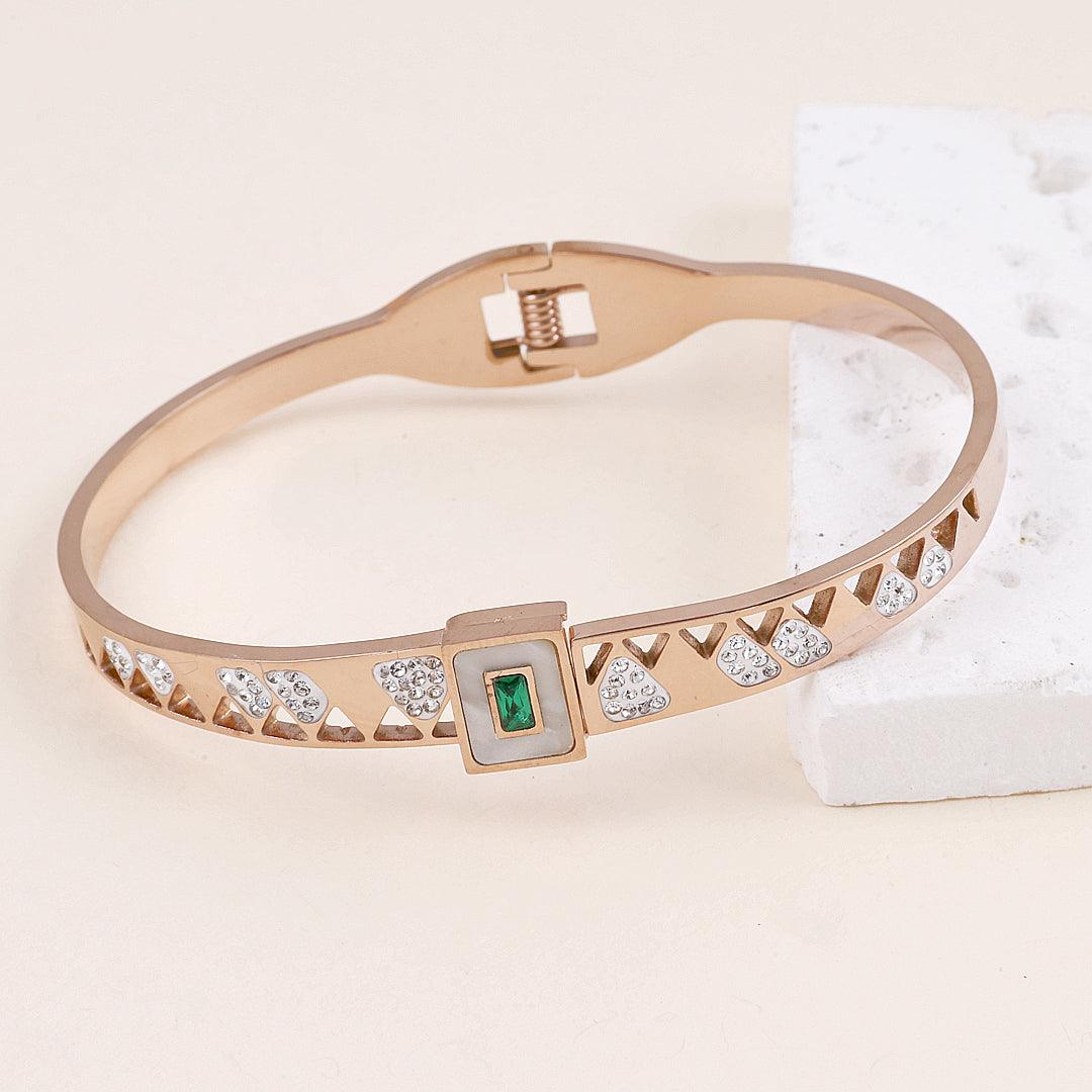 Rose Gold Plated Geometric Bracelet with Green Gemstone and Crystals".