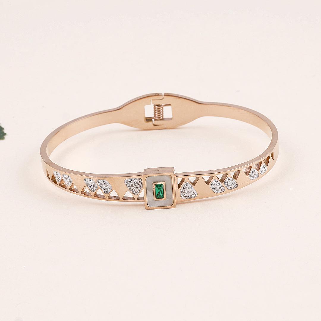 Rose Gold Plated Geometric Bracelet with Green Gemstone and Crystals".