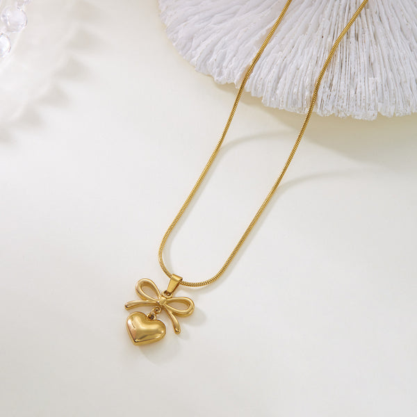 Golden small heart cute bow necklace