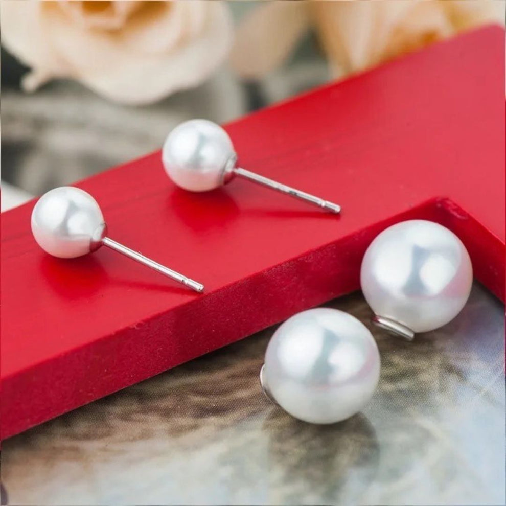 Double pearl stud earrings