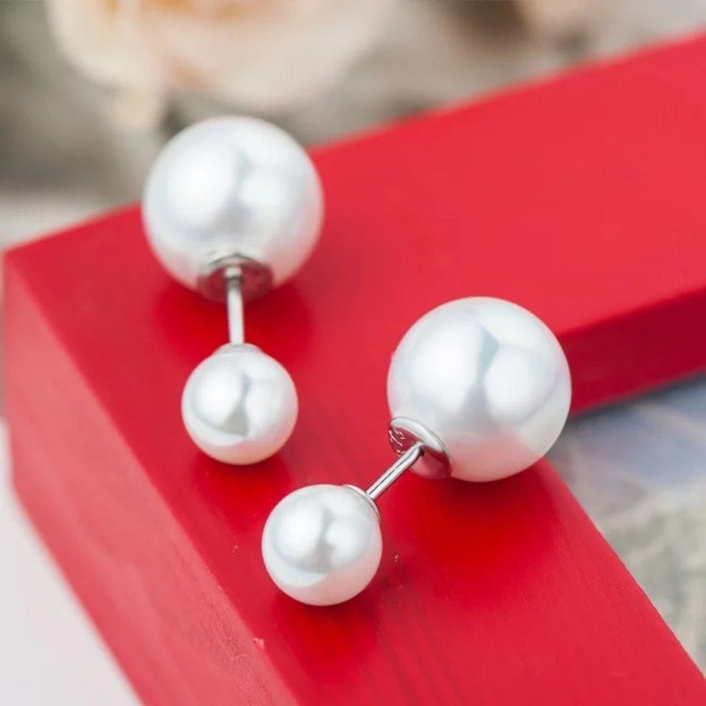 Double pearl stud earrings