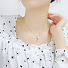 Golden chain and blue dolphin necklace