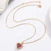 Angel Wings Wrapped Red Heart Zircon Pendant